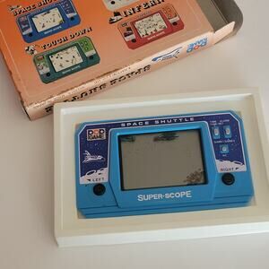 Vintage 1992 handheld game " Space shuttle". New, with manual. Collectable Item